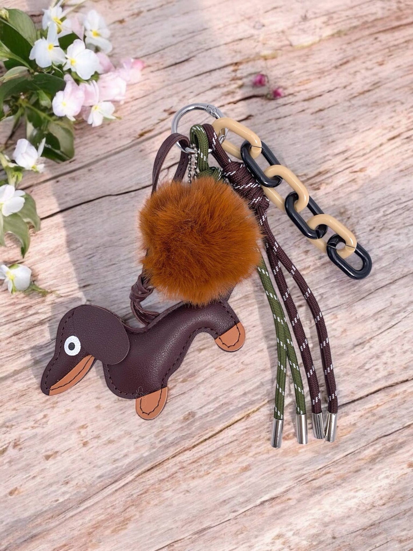 Tassen sleutelhanger hondje met pompon